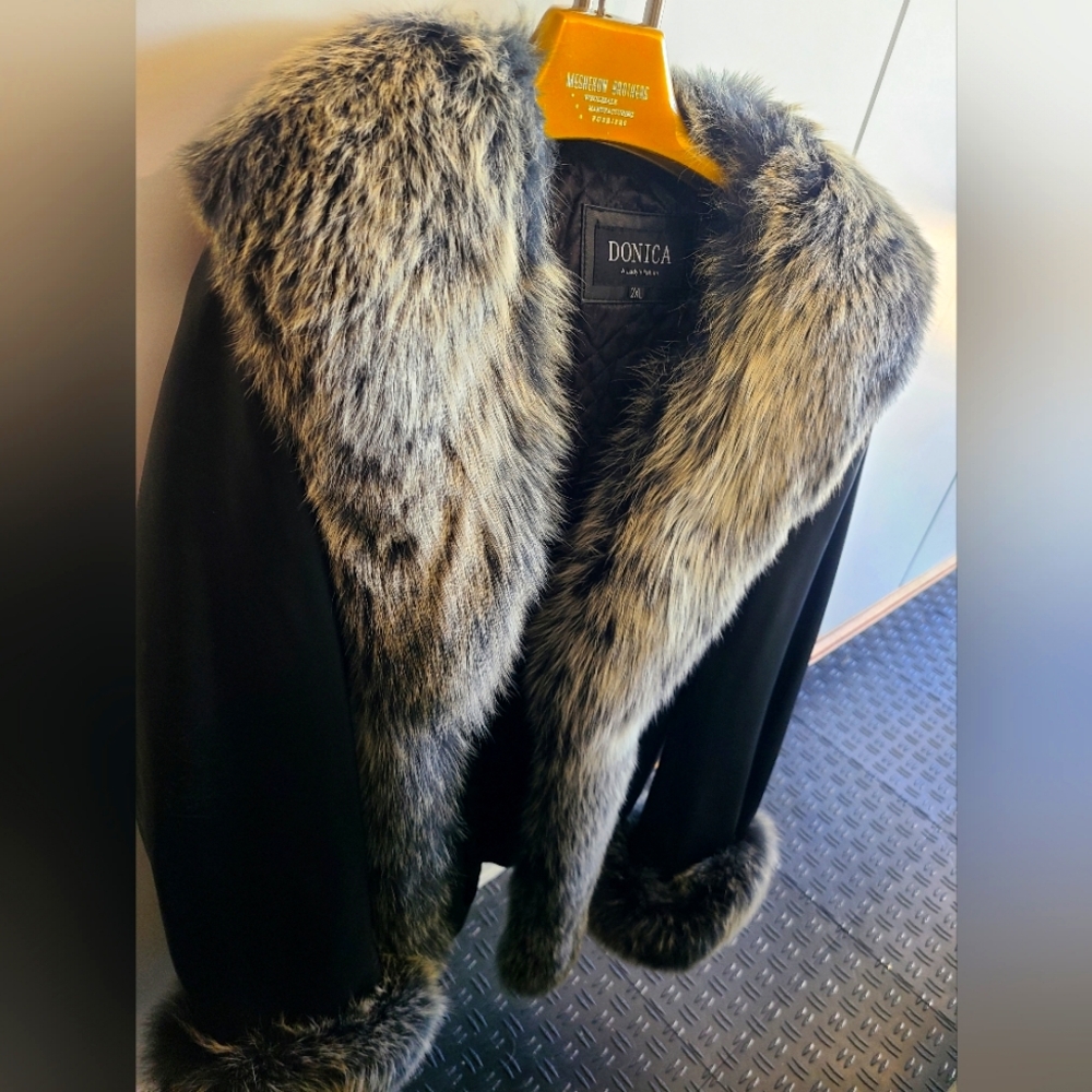 Leather jacket with beautiful fur collar